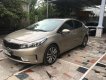 Kia Cerato AT 2016 - Cần bán Kia Cerato AT sản xuất 2016, màu nâu 