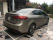 Kia Cerato AT 2016 - Cần bán Kia Cerato AT sản xuất 2016, màu nâu 