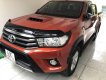 Toyota Hilux   2016 - Cần bán Toyota Hilux đời 2016, màu đỏ xe gia đình, giá 605tr