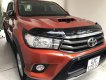 Toyota Hilux   2016 - Cần bán Toyota Hilux đời 2016, màu đỏ xe gia đình, giá 605tr