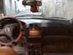 Mazda 323 2004 - Gia đình bán Mazda 323 2004, màu đen, 150tr