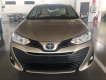 Toyota Vios 1.5E CVT 2018 - Bán xe Toyota Vios 1.5E CVT màu nâu, tăng gói bảo dưỡng 20.000km, hỗ trợ trả góp 90% giá xe. LH: 0912493498