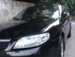 Mazda 323 2004 - Gia đình bán Mazda 323 2004, màu đen, 150tr