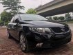 Kia Forte 2010 - Bán ô tô Kia Forte sản xuất 2010, màu đen chính chủ  