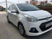 Hyundai Grand i10 2016 - Cần bán Hyundai Grand i10 2016, màu trắng như mới, giá chỉ 335 triệu