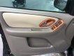 Ford Escape GX 2004 - Bán Ford Escape, màu đen sx 2004, máy 2.0 số sàn