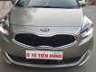 Kia Rondo GAT 2.0 AT 2015 - Bán Kia Rondo GAT 2.0 AT số tự động, model 2016, đời T12/2015, màu vàng cát mới 95%