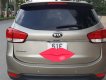 Kia Rondo GAT 2.0 AT 2015 - Bán Kia Rondo GAT 2.0 AT số tự động, model 2016, đời T12/2015, màu vàng cát mới 95%