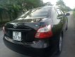 Toyota Vios   2011 - Bán xe Toyota Vios năm 2011, màu đen số sàn