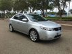 Kia Forte   2010 - Bán ô tô Kia Forte sản xuất năm 2010, màu bạc xe gia đình