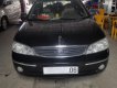 Ford Laser 2004 - Cần bán Ford Laser năm 2004, số tự động, màu đen, xe nhập