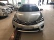 Toyota Corolla altis 1.8MT 2016 - Bán Toyota Corolla Altis 1.8MT sản xuất năm 2016, màu bạc, có trả góp