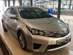 Toyota Corolla altis 1.8MT 2016 - Bán Toyota Corolla Altis 1.8MT sản xuất năm 2016, màu bạc, có trả góp