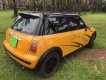 Mini Cooper   2004 - Cần bán lại xe Mini Cooper đời 2004, màu vàng