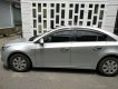 Chevrolet Cruze   2010 - Bán xe Chevrolet Cruze sản xuất 2010, màu bạc, 305 triệu