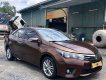 Toyota Corolla altis   2015 - Bán Toyota Corolla altis năm sản xuất 2015, màu nâu như mới, 665 triệu