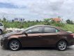 Toyota Corolla altis   2015 - Bán Toyota Corolla altis năm sản xuất 2015, màu nâu như mới, 665 triệu