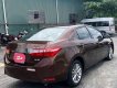 Toyota Corolla altis   2015 - Bán Toyota Corolla altis năm sản xuất 2015, màu nâu như mới, 665 triệu