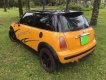 Mini Cooper   2004 - Cần bán lại xe Mini Cooper đời 2004, màu vàng