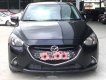 Mazda 2 1.5 AT 2016 - Cần bán lại xe Mazda 2 1.5 AT năm sản xuất 2016, màu đen số tự động, giá tốt