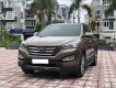 Hyundai Santa Fe 2016 - Cần bán lại xe Hyundai Santa Fe sản xuất năm 2016, màu nâu như mới