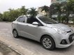 Hyundai Grand i10 1.25 2015 - Bán ô tô Hyundai Grand i10 1.25 đời 2015, màu bạc, nhập khẩu nguyên chiếc, giá 328tr