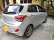 Hyundai Grand i10 2014 - Cần bán lại xe Hyundai Grand i10 đời 2014, màu bạc xe gia đình