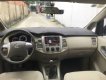 Toyota Innova E 2015 - Cần bán lại xe Toyota Innova E sản xuất 2015, màu bạc xe gia đình