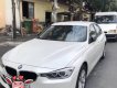 BMW 3 Series 320i 2012 - Bán BMW 320i sản xuất 2012, màu trắng, xe nhập