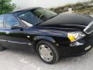 Daewoo Magnus 2004 - Bán Deawoo Mugnus đời 2004 số tự động, xe đẹp, sang trọng, giá rẻ 143 triệu