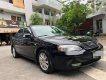 Ford Mondeo   2.5 V6  2004 - Bán Ford Mondeo 2.5 V6 đời 2004, màu đen xe gia đình