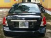 Chevrolet Lacetti  EX   2004 - Cần bán xe Chevrolet Lacetti EX năm sản xuất 2004, màu đen
