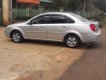 Daewoo Lacetti 2005 - Bán Daewoo Lacetti đời 2005, màu bạc xe gia đình