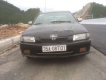 Mazda 323   2001 - Cần bán gấp Mazda 323 sản xuất năm 2001, màu đen, 105 triệu