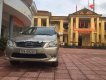 Toyota Innova E 2013 - Bán ô tô cũ Toyota Innova E đời 2013, màu vàng