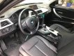 BMW 3 Series 20i3 2013 - Bán xe BMW 3 Series 320i đời 2013 màu đen, nội thất đen cực sang