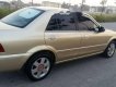 Ford Laser  1.8MT 2003 - Cần bán Ford Laser 1.8MT năm 2003, màu vàng chính chủ giá cạnh tranh