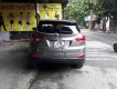 Hyundai Tucson 2.0 AT 4WD 2011 - Cần bán Hyundai Tucson 2.0 AT 4WD năm 2011, màu xám, xe nhập  