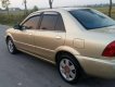 Ford Laser  1.8MT 2003 - Cần bán Ford Laser 1.8MT năm 2003, màu vàng chính chủ giá cạnh tranh