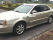 Daewoo Magnus   2002 - Cần bán lại xe Daewoo Magnus năm sản xuất 2002, màu vàng ít sử dụng