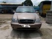 Kia Carnival GS 2009 - Cần bán xe Kia Carnival GS sản xuất 2009, màu vàng số tự động giá cạnh tranh