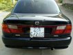 Mazda 323 2000 - Bán xe Mazda 323 đời 2000, xe đi làm hàng ngày, máy êm, số ngọt