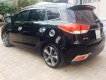 Kia Rondo 2.0 2016 - Bán ô tô Kia Rondo 2.0 2016, màu đen còn mới, 595 triệu
