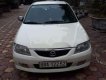 Mazda 323 2002 - Chính chủ bán ô tô Mazda 323 sản xuất năm 2002, màu trắng