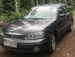 Ford Laser   Ghia  2002 - Cần bán lại xe Ford Laser Ghia đời 2002, màu xám, giá tốt