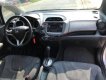 Honda FIT 1.5 AT 2009 - Cần bán lại xe Honda FIT 1.5 AT sản xuất 2009, màu bạc chính chủ, giá tốt