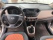 Hyundai i10 1.0MT Base 2014 - Cần bán gấp Hyundai i10 1.0MT Base 2014, màu bạc chính chủ