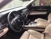 BMW 7 Series 750Li 2010 - Cần bán xe BMW 750Li 2010 màu trắng nhập Đức, xe nữ chạy kĩ