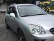 Kia Carens 2010 - Gia đình bán Kia Carens SX 2010, màu bạc số tự động