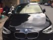 BMW 1 Series 116i 2013 - Bán em BMW 116i đời 2013 màu đen, số tự động, 8 cấp